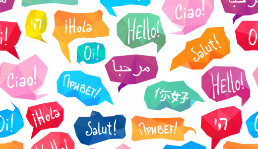 Colourful speech bubbles displaying greetings in multiple languages, including “Hello”, “Hola” and “Salut”.