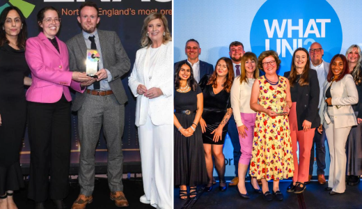 Group of people on stage receiving an award and posing together at a university awards ceremony with event branding in the background.