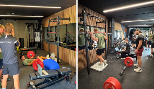 Participants taking part in a strength and conditioning session in a gym, using weights and exercise equipment.